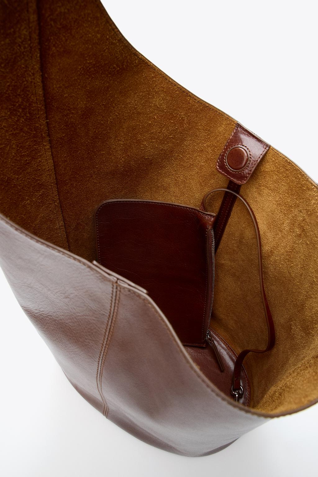 КОЖАНАЯ СУМКА-МЕШОК АСИММЕТРИЧНОГО КРОЯ