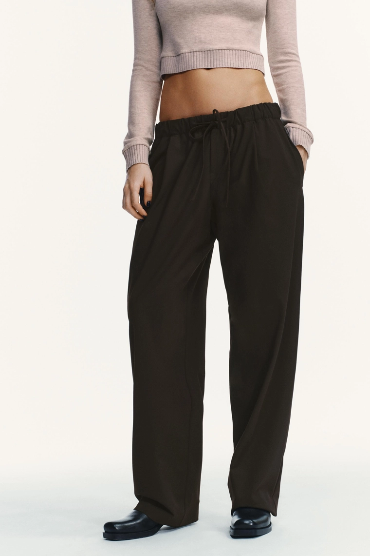 БРЮКИ С ЗАЩИПАМИ