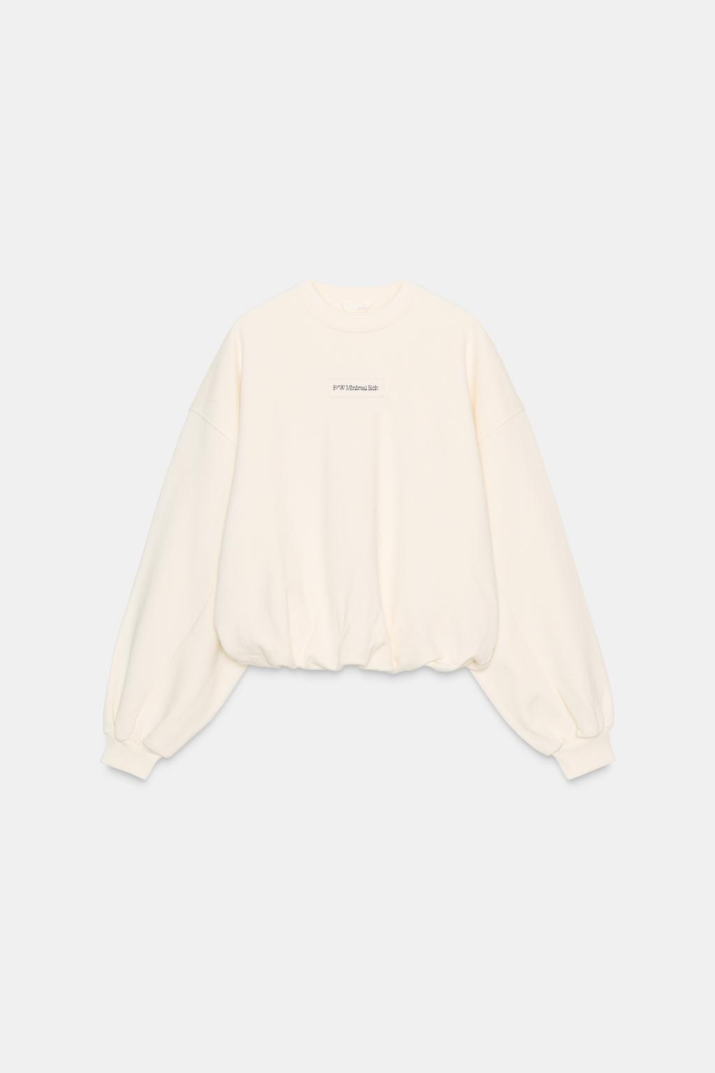 ТОЛСТОВКА С ВЫШИТОЙ НАДПИСЬЮ В ВИДЕ ШАРА