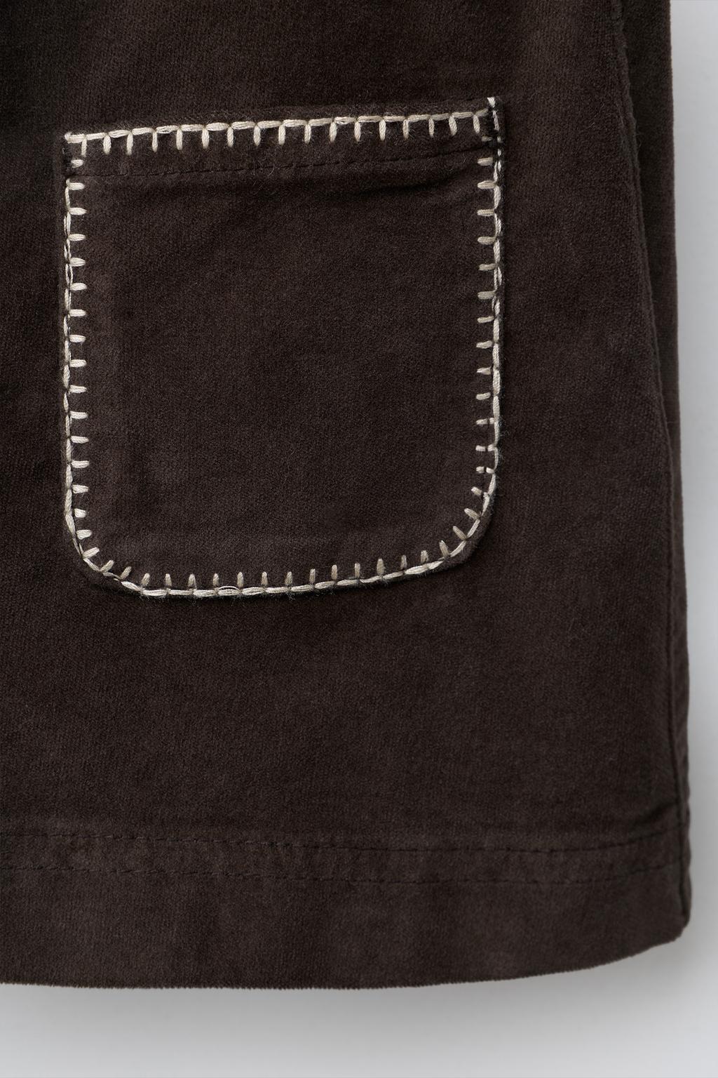 БАРХАТНАЯ ЮБКА С ПРОРЕЗНЫМИ КАРМАНАМИ