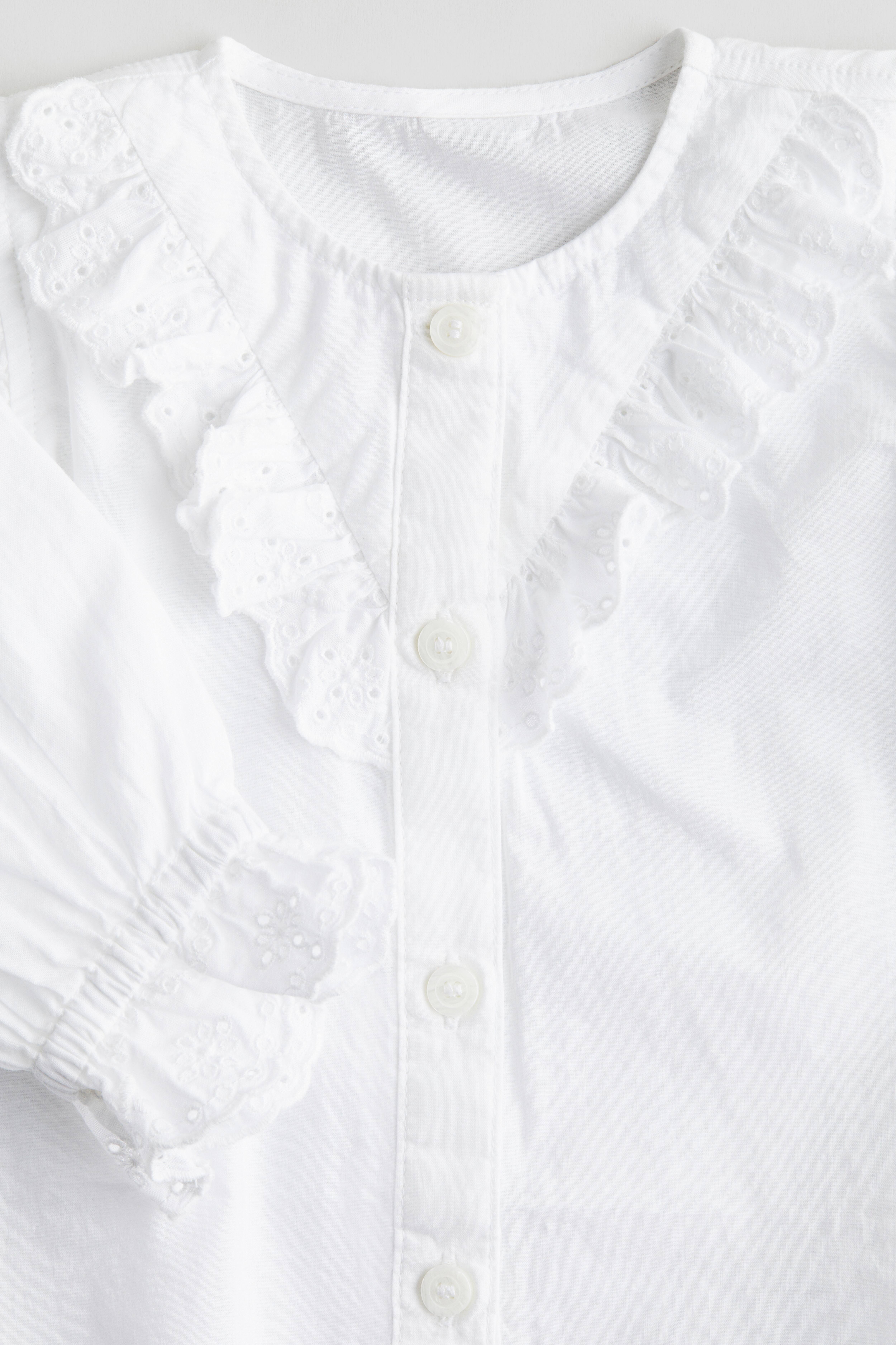 Blusa из хлопка с деталями оборками