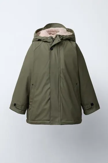 Прорезиненная куртка WATER REPELLENT на искусственной овчине