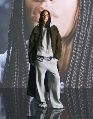 Расклешенные брюки из мягкой ткани OUT OF CORE- Заказать в России