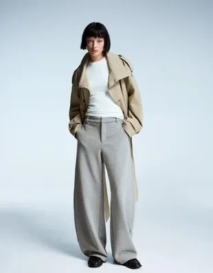 Брюки объемного кроя, зауженные книзу- Заказать в России