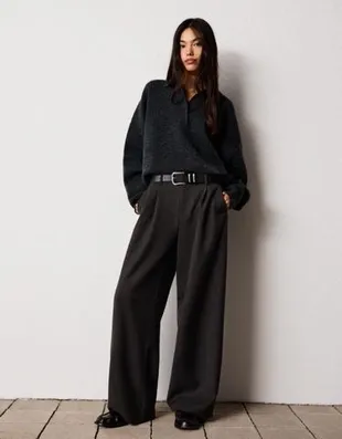 Брюки объемного кроя из двухслойной ткани- Заказать в России