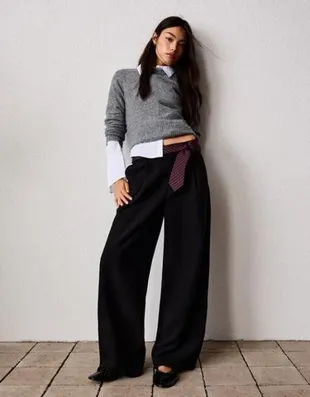 Черный пуховик с объемным ворсом