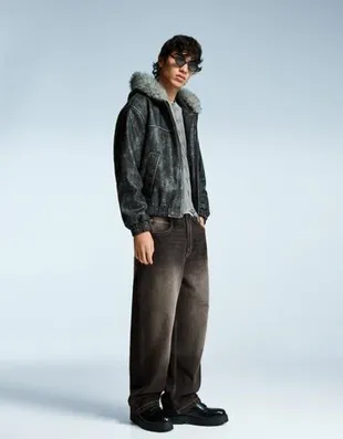 Джинсы очень широкие с заклепками- Заказать в России