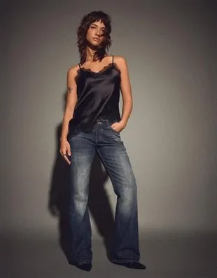 Расклешенные джинсы свободного кроя- Заказать в России