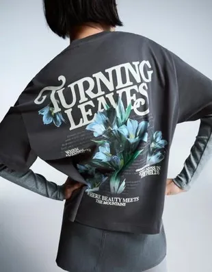 Футболка оверсайз с короткими рукавами и принтом- Заказать в России