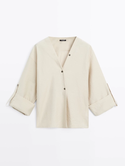 SHIRT WITH ROLLED-UP SLEEVES