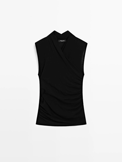 SLEEVELESS DRAPED TOP