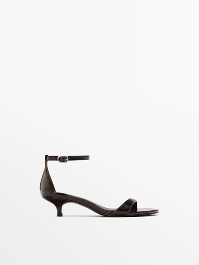 STRAPPY HEELED SANDALS