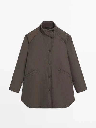 Длинный пуховик- Заказать в России