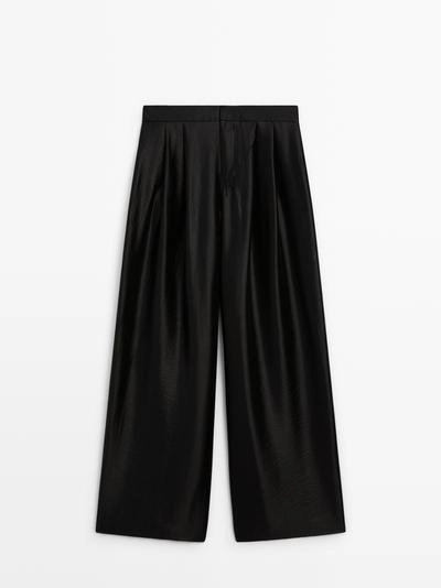 Широкие воздушные брюки с линиями