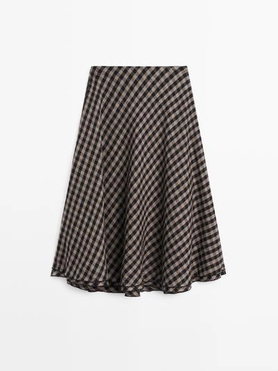Расклешенная юбка с клетчатым узором- Заказать в России