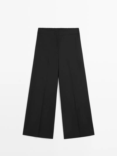 Широкие укороченные брюки из 100% шерсти- Заказать в России