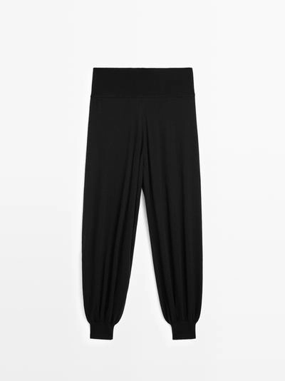 Шерстяные вязаные брюки-саруэль- Заказать в России