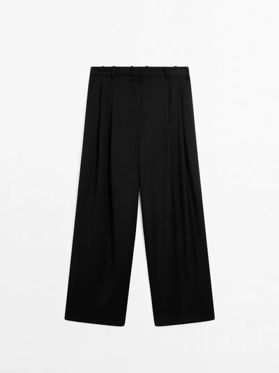 Брюки-слипы из 100% шерсти с запахом- Заказать в России