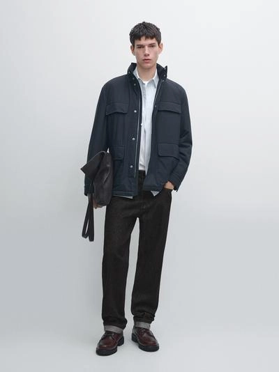 Пуховик с карманами и водоотталкивающей отделкой- Заказать в России