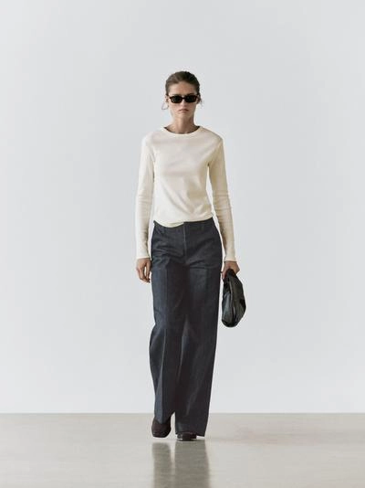 Джинсы с широкими штанинами и средней посадкой- Заказать в России