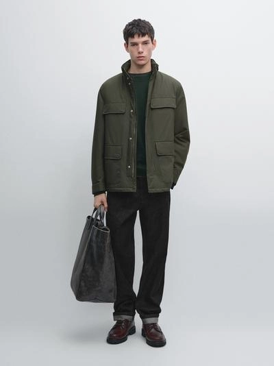 Пуховик с карманами и водоотталкивающей отделкой- Заказать в России