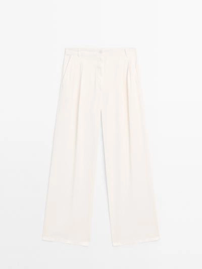 Брюки с широкими брючинами и двойными стрелками