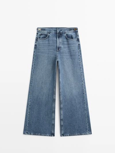 Джинсы с расклешенными брючинами средней посадки- Заказать в России
