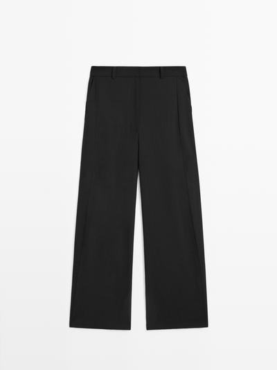 Zara Брюки из шерстяной смеси с деталями шва купить с доставкой.