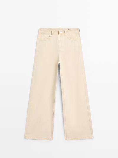 Брюки с низкой посадкой и широкими брючинами