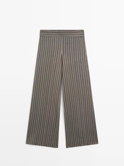 Брюки широкие с полосатыми деталями