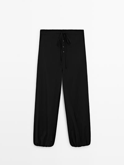 Zara Шерстяные брюки саруэль с деталью завязки купить с доставкой.