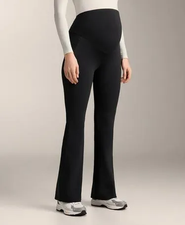 Теплые брюки-клеш для беременных черного цвета- Заказать в России