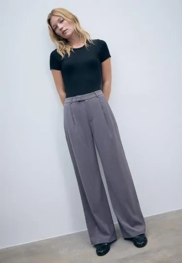 Брюки в классическом стиле с широкими штанинами- Заказать в России