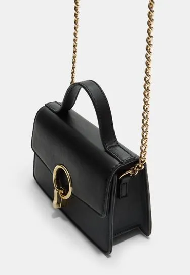 Сумка через плечо с круглой застежкой