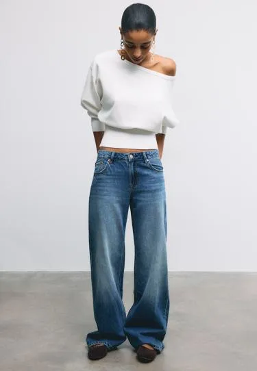 Трикотажный свитер асимметричного кроя в рубчик- Заказать в России