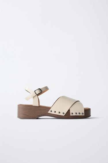 Zara Нейтральные деревянные сабо с эффектом лака купить с доставкой.