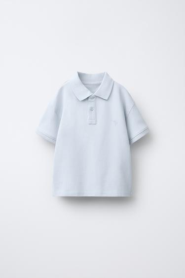 Zara Поло с вышитым пальмовым деревом