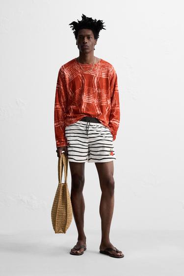 Zara Плавки с принтом средней длины © OTIS KWAME KYE QUAICOE