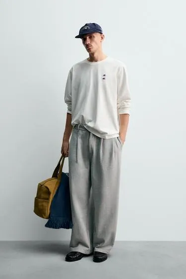 Брюки RELAXED FIT со складками CHAMPION ® X ZARA
