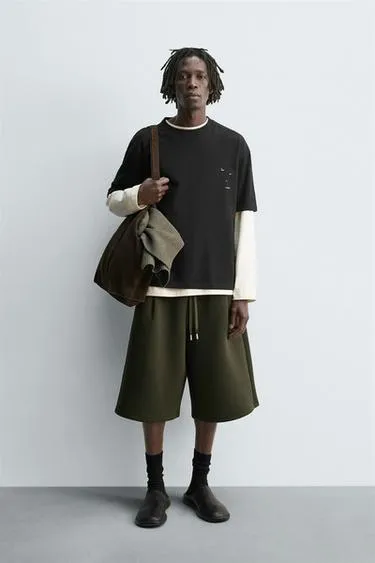 Футболка с принтом колец- Заказать в России