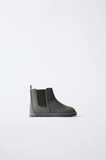 FASHIONABLE LEATHER BOOTS