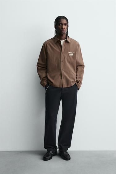 Zara Рубашка в полоску с графическим принтом купить с доставкой.