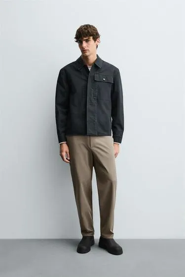 Брюки из рельефной ткани комфортного кроя