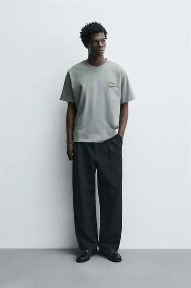 Футболка с вышивкой в виде рыбы