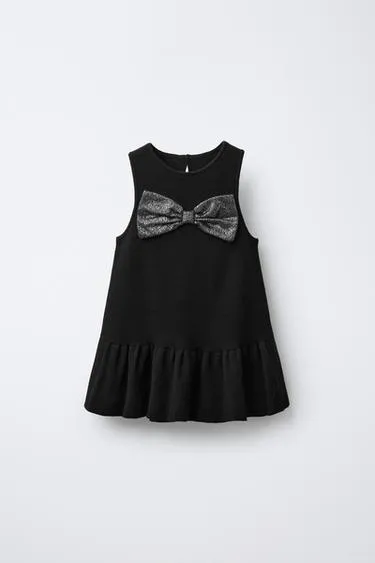Трикотажное платье с блестящим бантом