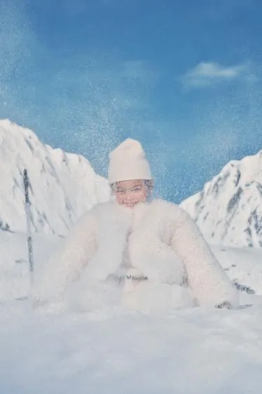 Пуховик из искусственного меха- Заказать в России