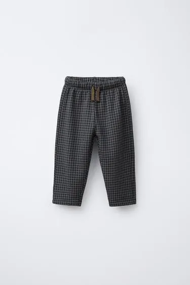 BAGGY CHECK TROUSERS- Заказать в России