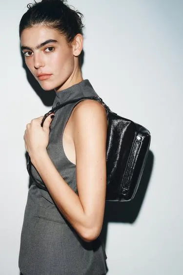 Многофункциональная сумка через плечо