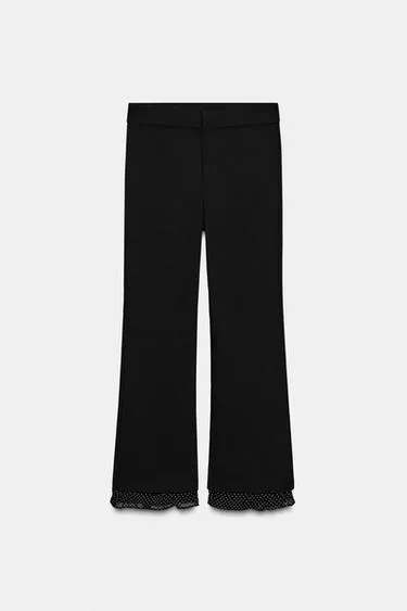 Мини-брюки с расклешенными штанинами и оборкой- Заказать в России