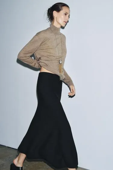 Трикотажная расклешенная юбка миди- Заказать в России